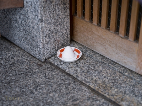 Mori shio or salt mound outside the doorway to a restaurant