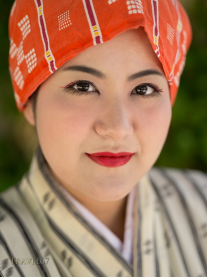 Okinawan woman in traditional dress.