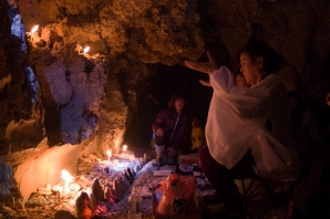 On April 3rd 2014 (3rd day of 3rd month in Okinawa calendar) Yuta (priestess) Ayako Toguchi conducts a special ceremony in a sea cave called Sururu Gama on the coast of Kouri Island, Okinawa, Japan
