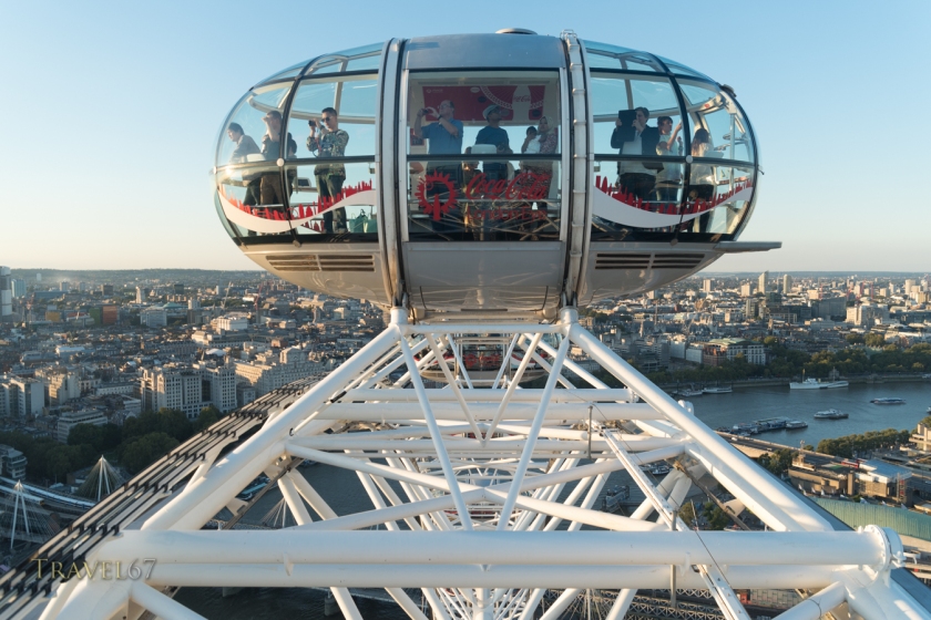 London Eye ferris wheel overlooking the Thames River, London, England.